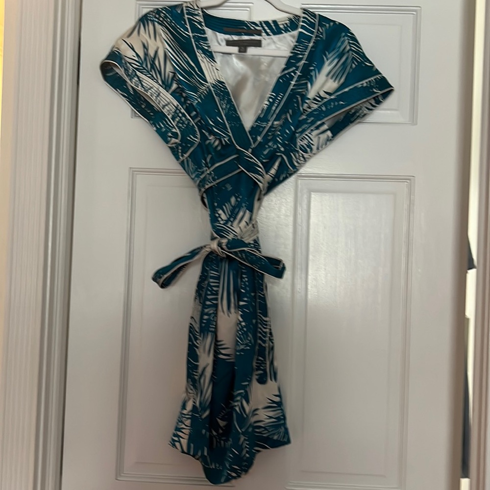 Never worn adorable dress. So simple and pretty